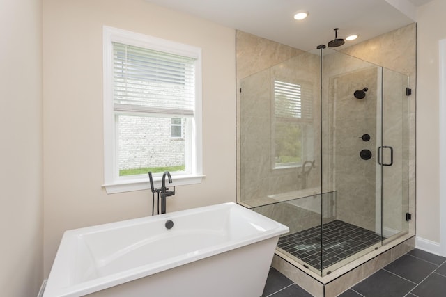 5962 Hunt Valley Dr, Spring Hill, TN 37174 - full bath featuring a freestanding tub, healthy amount of natural light, tile patterned floors, a shower stall, and recessed lighting