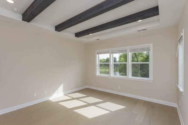 5962 Hunt Valley Dr, Spring Hill, TN 37174 - empty room with wood finished floors, beamed ceiling, baseboards, and recessed lighting