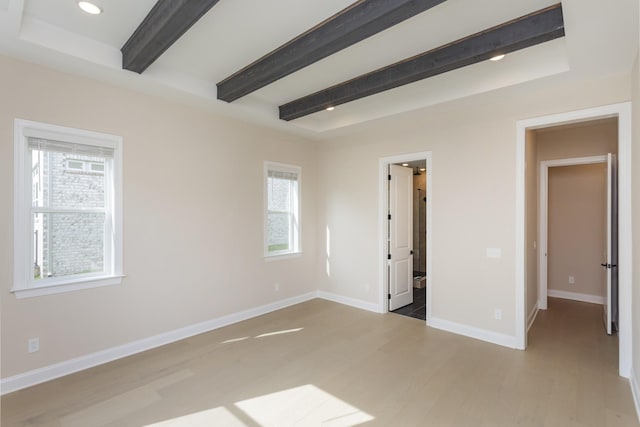 5962 Hunt Valley Dr, Spring Hill, TN 37174 - unfurnished bedroom with beam ceiling, wood finished floors, baseboards, and recessed lighting