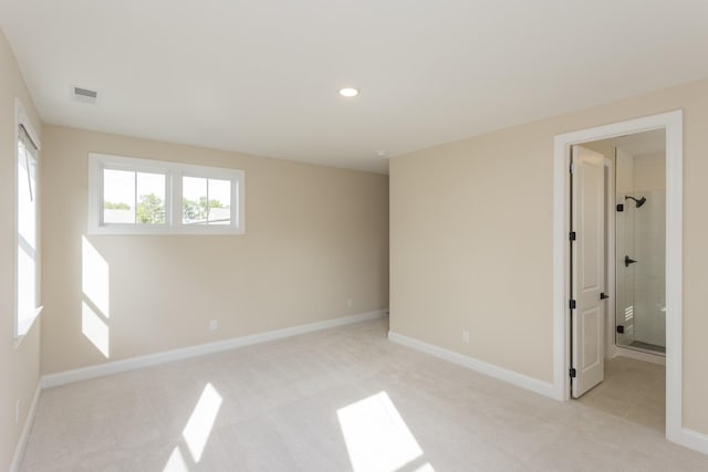 5962 Hunt Valley Dr, Spring Hill, TN 37174 - unfurnished bedroom featuring light carpet, baseboards, recessed lighting, and ensuite bath