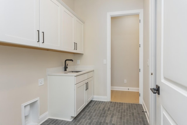 5962 Hunt Valley Dr, Spring Hill, TN 37174 - washroom with baseboards, hookup for an electric dryer, and cabinet space