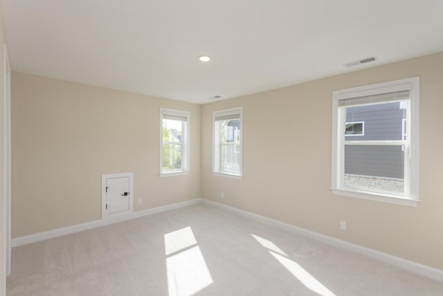 5962 Hunt Valley Dr, Spring Hill, TN 37174 - unfurnished room featuring light carpet, baseboards, and recessed lighting