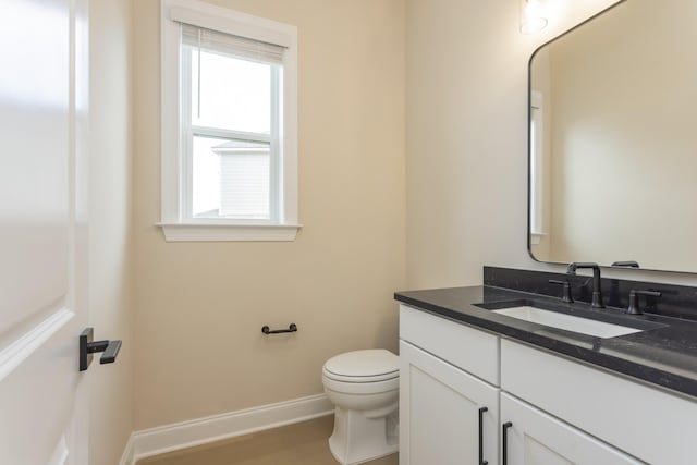 5962 Hunt Valley Dr, Spring Hill, TN 37174 - bathroom with vanity, toilet, baseboards, and healthy amount of natural light