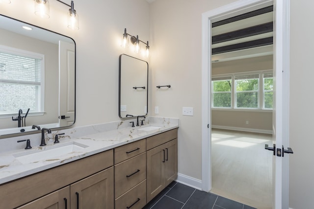 5962 Hunt Valley Dr, Spring Hill, TN 37174 - full bathroom with double vanity, tile patterned flooring, and baseboards