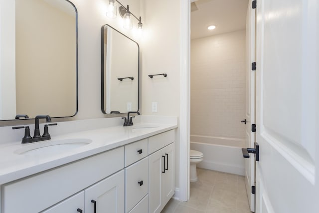 5962 Hunt Valley Dr, Spring Hill, TN 37174 - full bath featuring toilet, double vanity, tile patterned floors, shower / bathtub combination, and recessed lighting