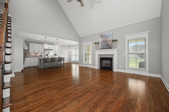 193 Knoxleigh Way, Murfreesboro, TN 37129 - living area featuring high vaulted ceiling, a ceiling fan, a fireplace, dark wood finished floors, and baseboards
