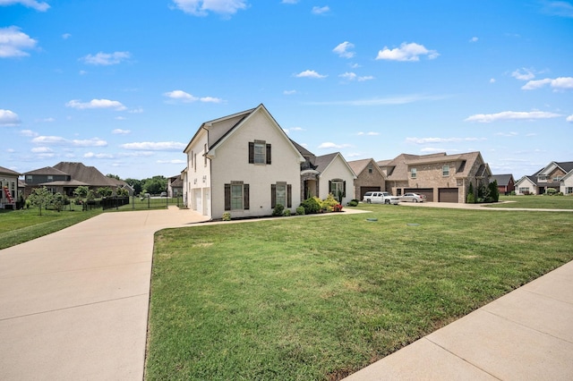 193 Knoxleigh Way, Murfreesboro, TN 37129 - french country style house with a residential view, concrete driveway, a front yard, and a garage