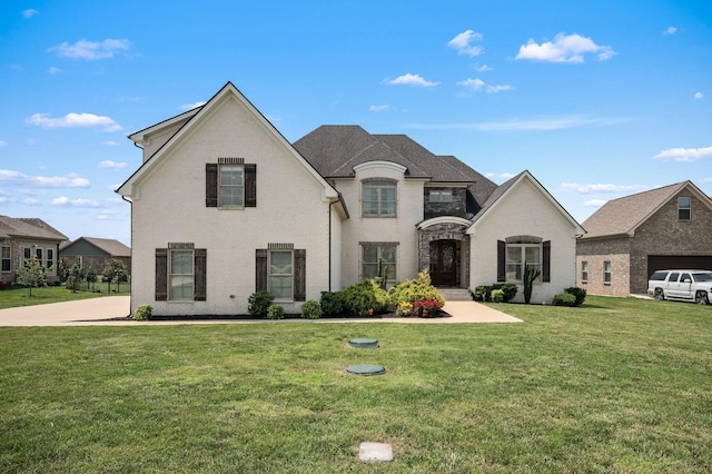 193 Knoxleigh Way, Murfreesboro, TN 37129 - french country style house with a front yard and brick siding