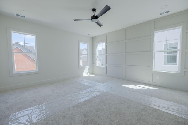4072 Penfield Dr Unit B, Franklin, TN 37069 - carpeted empty room featuring a ceiling fan and a decorative wall