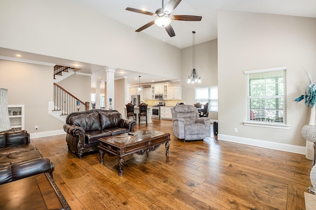 813 Stone Mill Cir, Murfreesboro, TN 37130 - living room with high vaulted ceiling, a ceiling fan, stairs, hardwood / wood-style floors, and baseboards