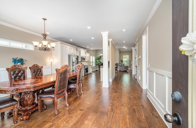 813 Stone Mill Cir, Murfreesboro, TN 37130 - dining area featuring a chandelier, dark wood-style floors, ornamental molding, recessed lighting, and ornate columns