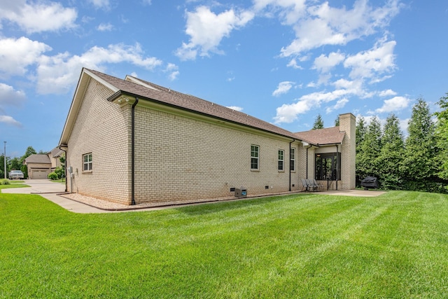 813 Stone Mill Cir, Murfreesboro, TN 37130 - back of house featuring brick siding, a chimney, a patio area, and a yard