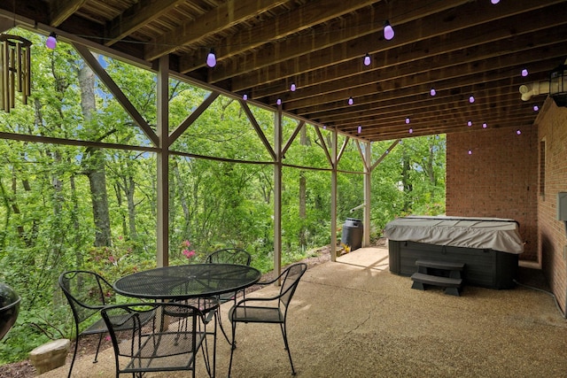 6781 Autumnwood Dr, Nashville, TN 37221 - view of patio with a hot tub and outdoor dining space