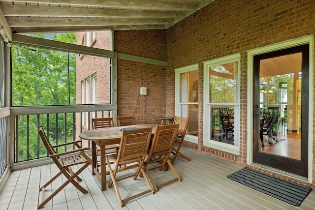 6781 Autumnwood Dr, Nashville, TN 37221 - sunroom with outdoor dining space and beam ceiling