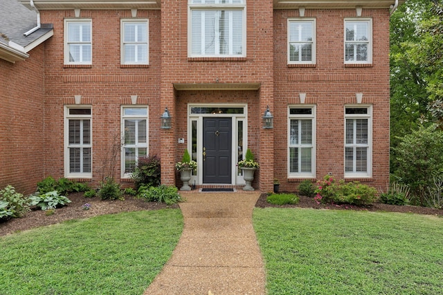 6781 Autumnwood Dr, Nashville, TN 37221 - view of front of house with a front lawn and brick siding