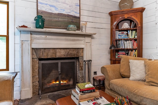 3975 Dry Creek Rd, Dowelltown, TN 37059 - living area with a lit fireplace and wood walls
