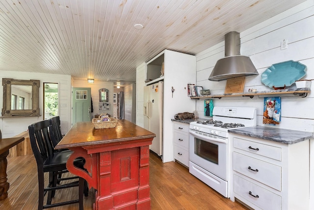3975 Dry Creek Rd, Dowelltown, TN 37059 - kitchen with white appliances, open shelves, light wood-style flooring, white cabinets, and wooden ceiling