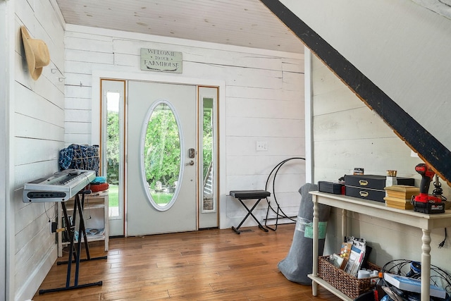 3975 Dry Creek Rd, Dowelltown, TN 37059 - foyer featuring wooden walls, plenty of natural light, and hardwood / wood-style floors