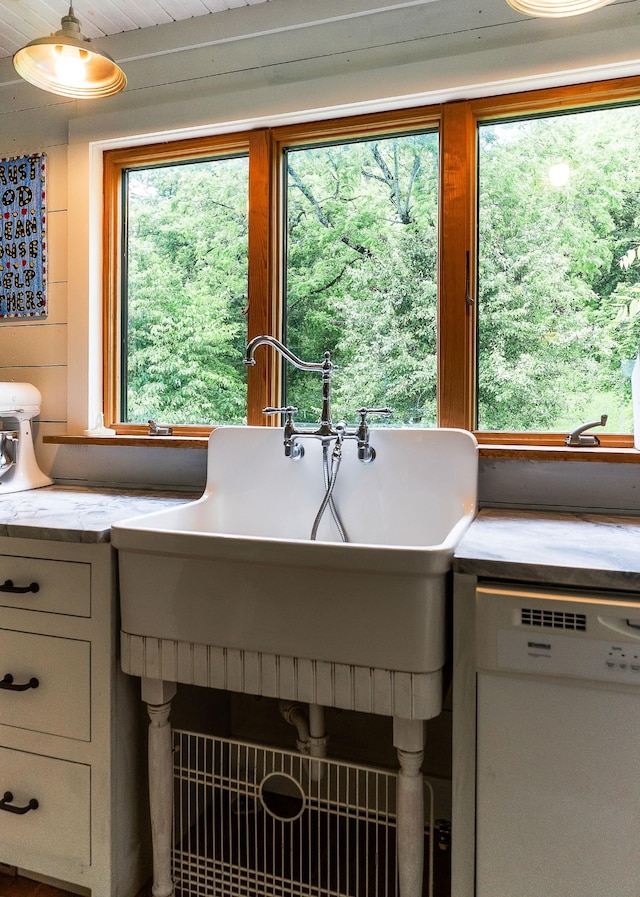 3975 Dry Creek Rd, Dowelltown, TN 37059 - kitchen view of white dishwasher and light countertops
