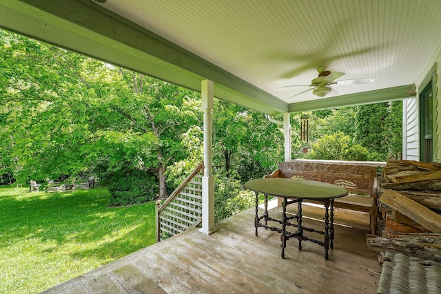 3975 Dry Creek Rd, Dowelltown, TN 37059 - deck featuring a ceiling fan, a yard, stairway, and outdoor dining area
