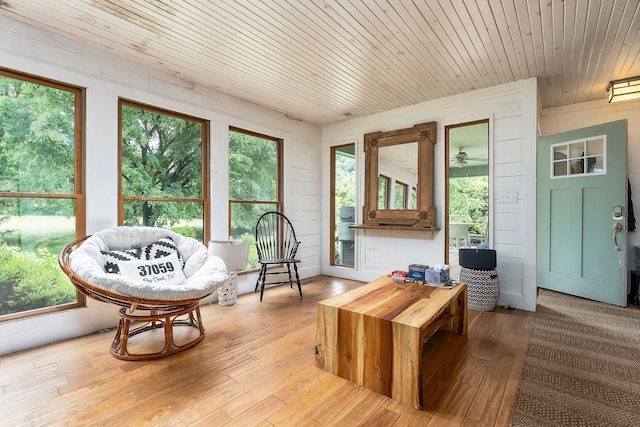 3975 Dry Creek Rd, Dowelltown, TN 37059 - sunroom / solarium with wood walls, hardwood / wood-style floors, plenty of natural light, and wooden ceiling