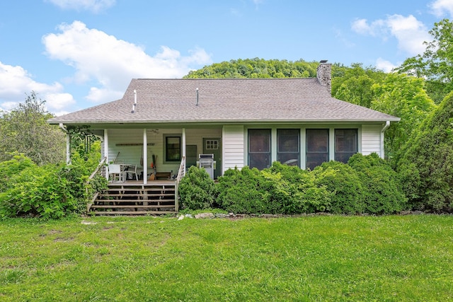 3975 Dry Creek Rd, Dowelltown, TN 37059 - back of house featuring a yard, a chimney, and roof with shingles