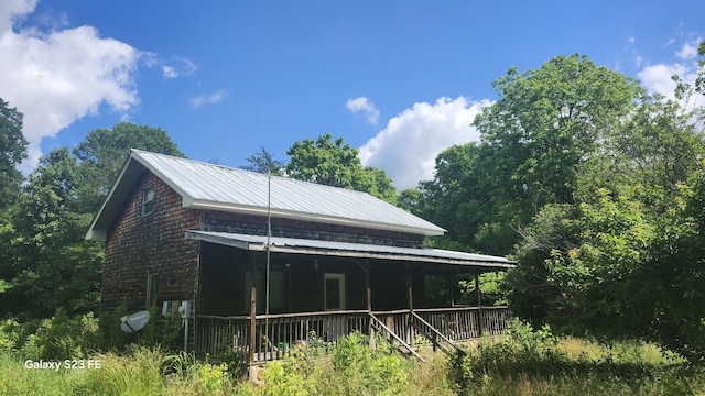 1935 Fairview Rd, Tellico Plains, TN 37385 - rear view of property with covered porch and metal roof