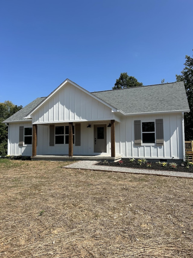 5720 Little Dry Creek Rd, Pulaski, TN 38478 - view of front of property with board and batten siding, roof with shingles, and covered porch