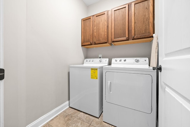 2157 Christina Ct, Hermitage, TN 37076 - washroom with cabinet space, washer and clothes dryer, and baseboards