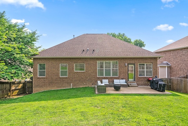 2157 Christina Ct, Hermitage, TN 37076 - back of property featuring a patio area, roof with shingles, brick siding, and outdoor lounge area