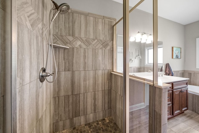 2157 Christina Ct, Hermitage, TN 37076 - full bath with vanity, a tile shower, a wainscoted wall, and tile patterned floors