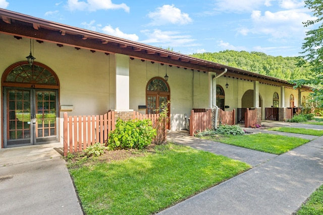 210 Old Hickory Blvd Unit 42, Nashville, TN 37221 - view of front of house featuring french doors, stucco siding, and stone siding