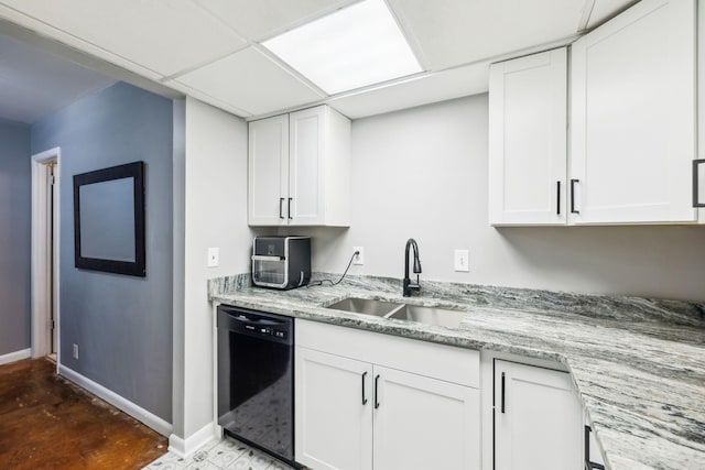 210 Old Hickory Blvd Unit 42, Nashville, TN 37221 - kitchen featuring black dishwasher, a sink, baseboards, and white cabinets
