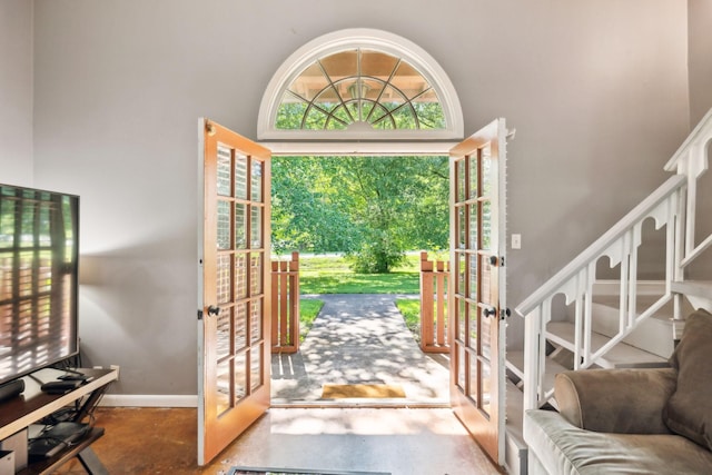 210 Old Hickory Blvd Unit 42, Nashville, TN 37221 - foyer featuring french doors, finished concrete flooring, baseboards, and a high ceiling
