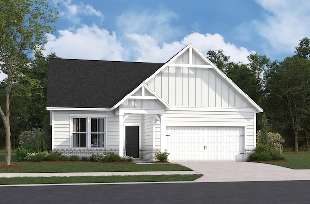 1779 Kemp Dr, Hermitage, TN 37076 - view of front of property with board and batten siding, roof with shingles, an attached garage, and concrete driveway