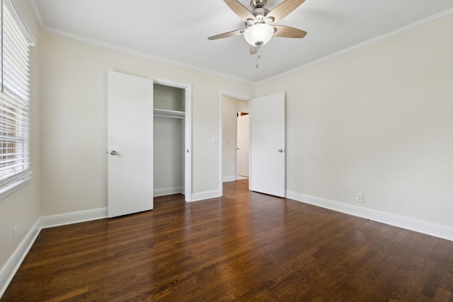 510 Bismark Dr, Nashville, TN 37210 - unfurnished bedroom with wood finished floors, crown molding, a closet, baseboards, and ceiling fan