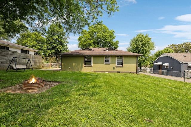 510 Bismark Dr, Nashville, TN 37210 - rear view of property with a fire pit and crawl space