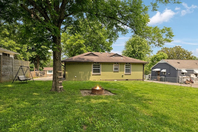 510 Bismark Dr, Nashville, TN 37210 - rear view of house featuring a fire pit and crawl space