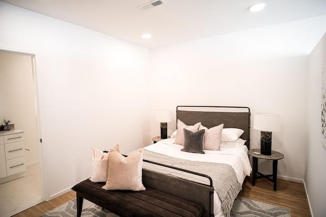 806 Olympic St Unit 305, Nashville, TN 37203 - bedroom featuring light wood finished floors, recessed lighting, and baseboards