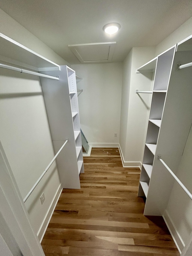 5712 Little Dry Creek Rd, Pulaski, TN 38478 - spacious closet featuring attic access and wood finished floors