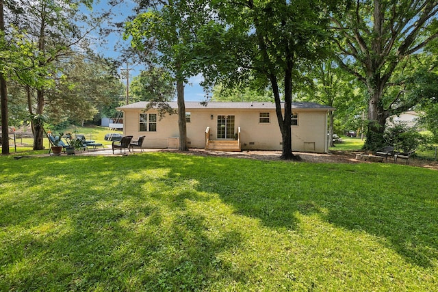 304 Jenny Murff Dr, Antioch, TN 37013 - back of property with a patio area and a yard