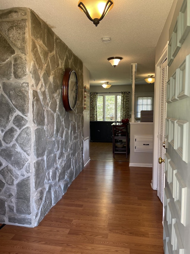 464 Loop Dr, Winchester, TN 37398 - hallway featuring a textured ceiling and wood finished floors