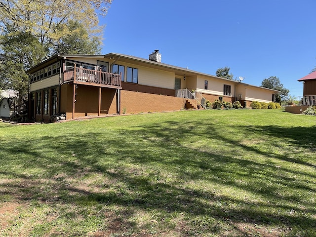 464 Loop Dr, Winchester, TN 37398 - rear view of property featuring a chimney, a yard, and a deck