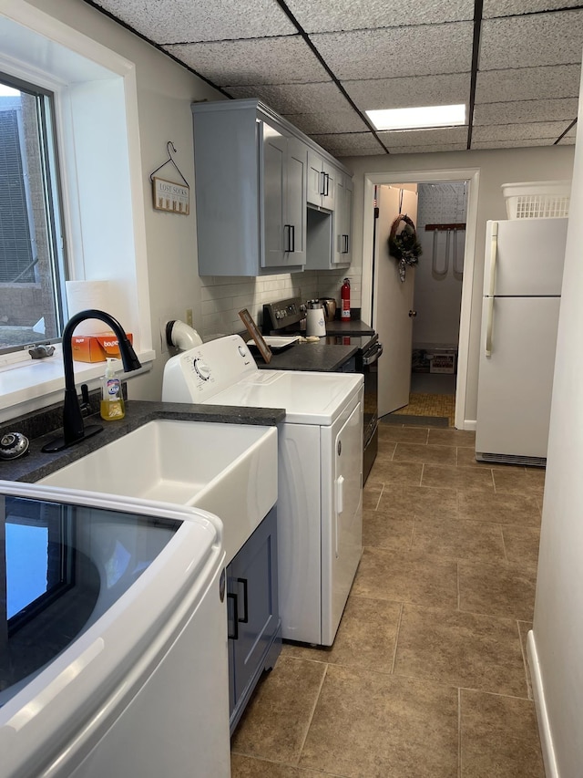 464 Loop Dr, Winchester, TN 37398 - laundry area with washer / dryer and cabinet space