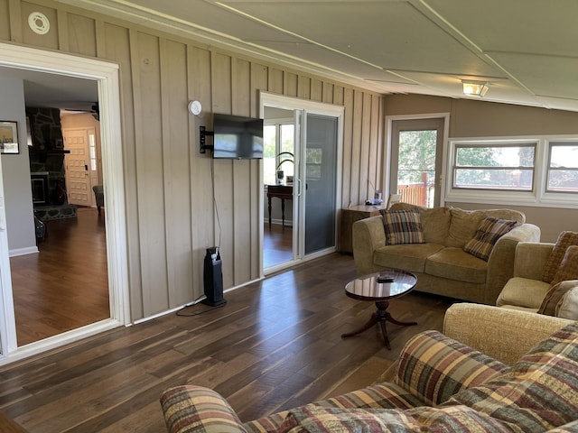 464 Loop Dr, Winchester, TN 37398 - living area featuring dark wood-style floors, lofted ceiling, and wooden walls