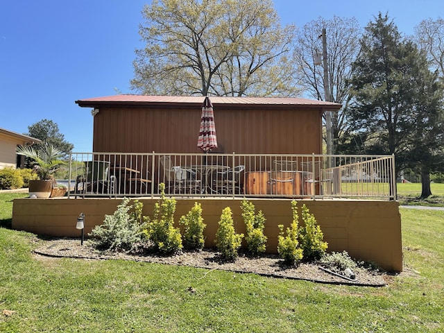 464 Loop Dr, Winchester, TN 37398 - back of house featuring a yard and metal roof