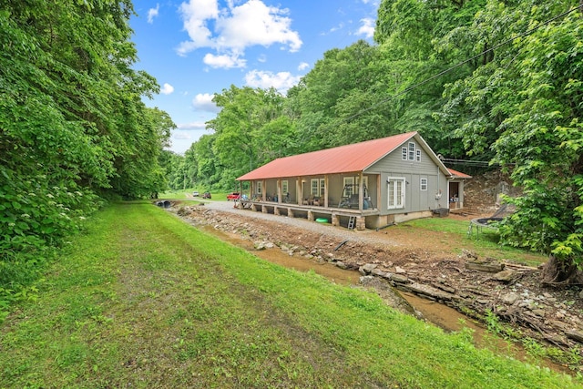 333 Cubbins Hollow Rd, Dowelltown, TN 37059 - view of yard featuring a wooded view