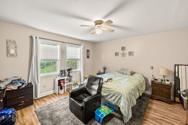 333 Cubbins Hollow Rd, Dowelltown, TN 37059 - bedroom featuring light wood-type flooring, baseboards, and a ceiling fan