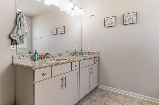 6531 Tulip Tree Dr, Murfreesboro, TN 37128 - bathroom featuring double vanity, baseboards, and tile patterned flooring