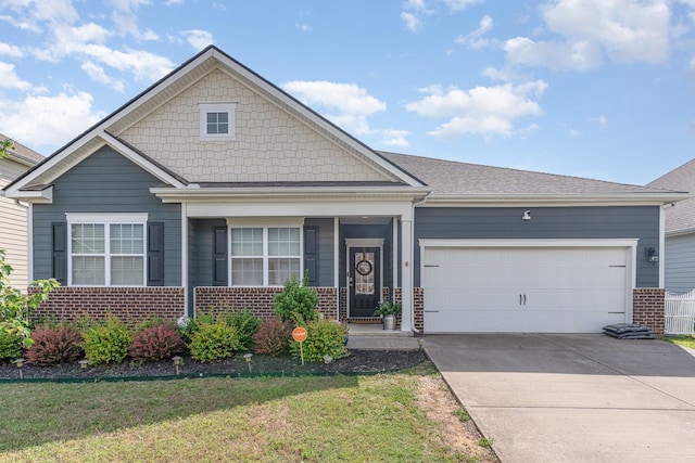 6531 Tulip Tree Dr, Murfreesboro, TN 37128 - view of front of house with brick siding, driveway, an attached garage, and a front lawn